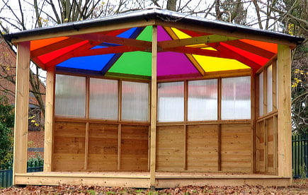 Bespoke open gazebo outdoor classroom with coloured polycarbonate roof